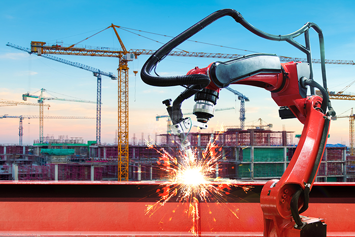 What effect will construction robots have on the demand for skilled labour? [image of robotic welder] 